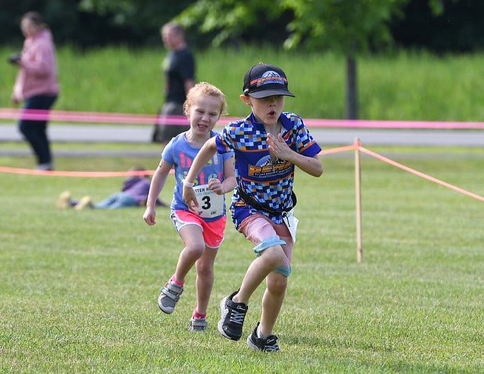 kids participating the running portion of the YMCA Otter Romp