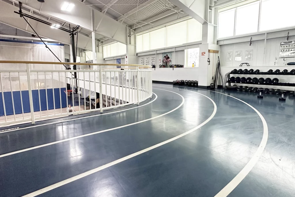 the blue colored indoor track a the keene YMCA