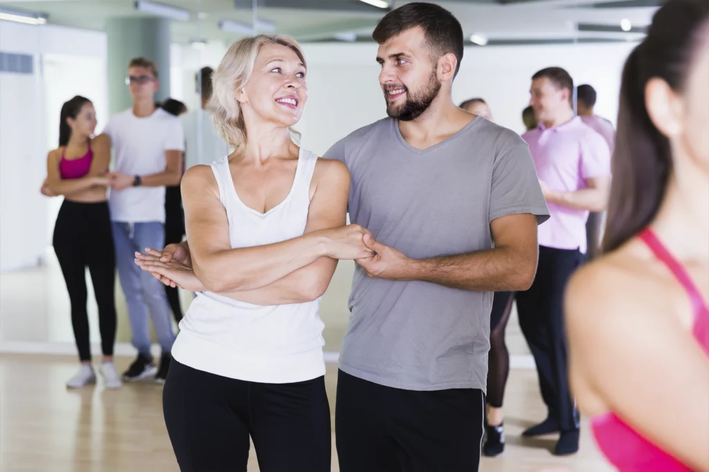 two people learning to dance at the keene YMCA